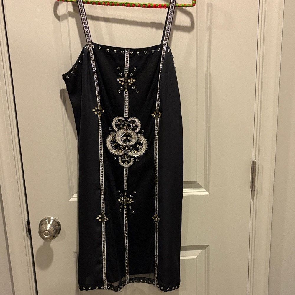 Elegant White House Black Market Black Embellished Dress size 4